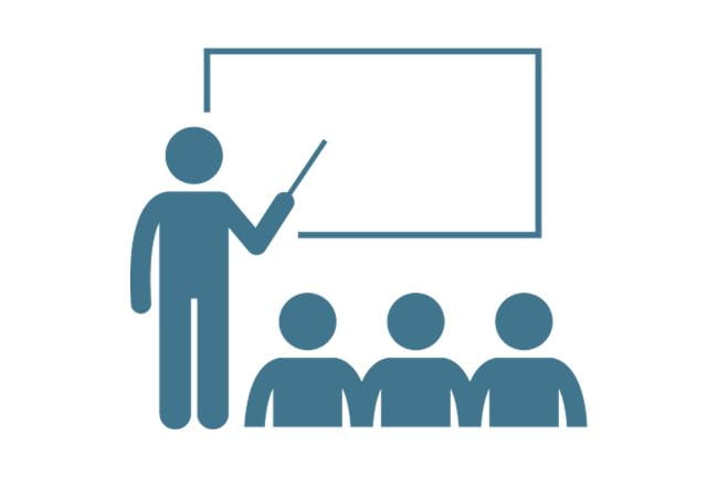 An icon of a person pointing to a screen.