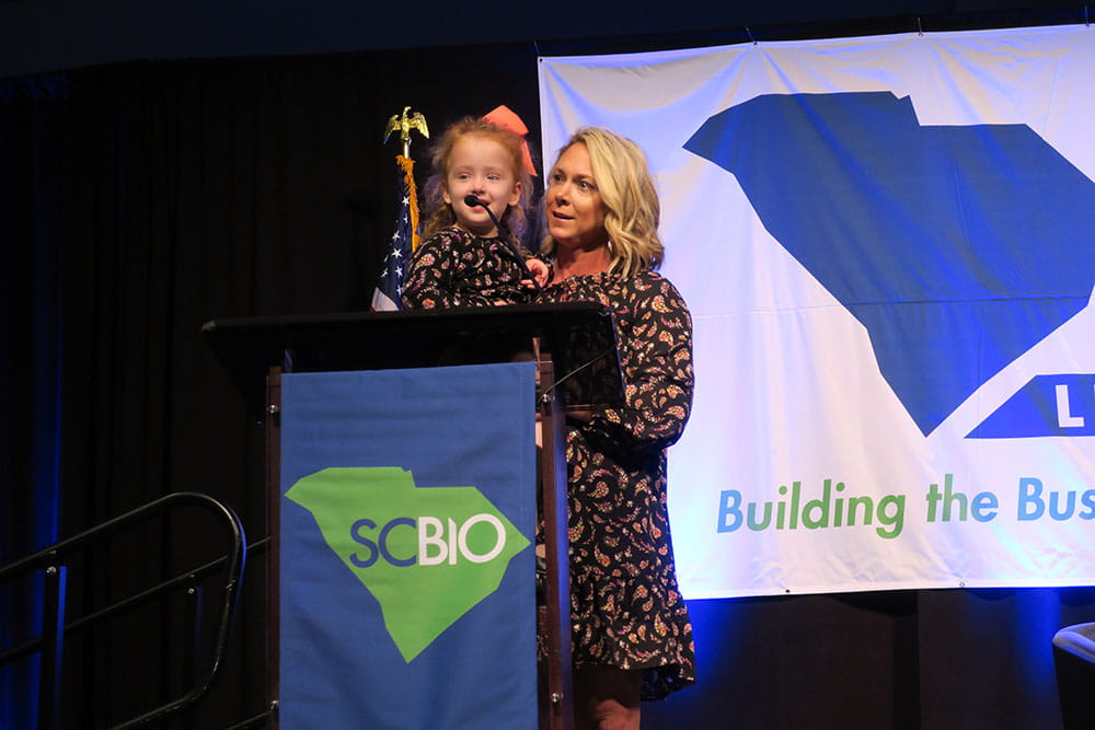 Mother and daughter on stage at SCBIO