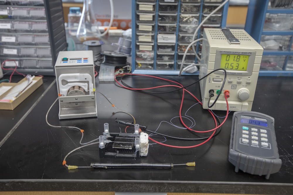 The novel device includes a heating element to get the nanoparticles to release the chemotherapy drug and an activated carbon filter to remove the drug. Photograph by Sarah Pack.