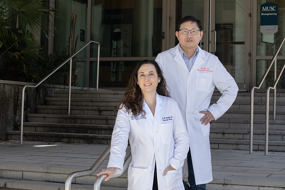 Vascular surgeon Dr. Jean Marie Ruddy (front) and bioengineer Dr. Ying Mei (back) are collaborating on potentially heart-saving science.