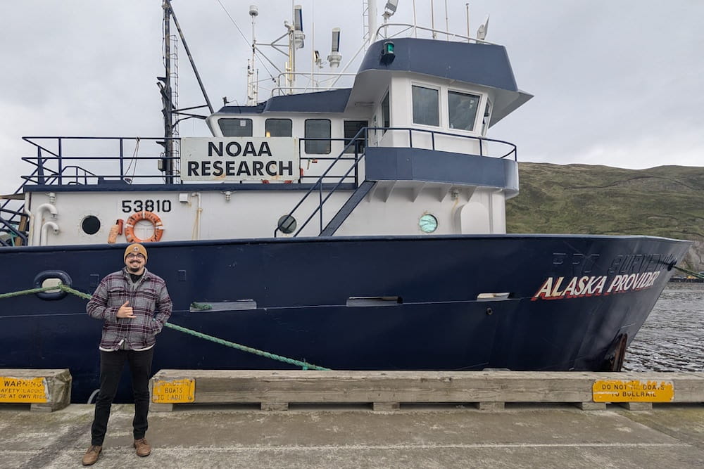 Dr. Cody Dickinson in front of the Alaska Provider.