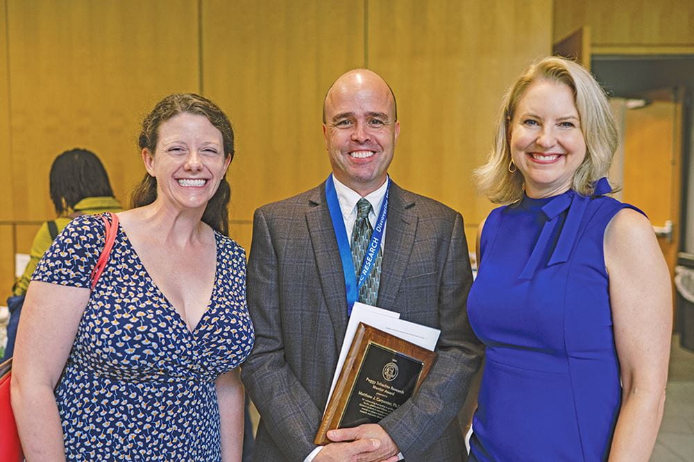 Dr. Lindsey Jennings (Population Health Award), left, and Dr. Matthew Carpenter (Peggy Schachte Research Mentor Award) with James W. Colbert speaker Dr. Heather Farley, MUSC chief wellbeing officer. 