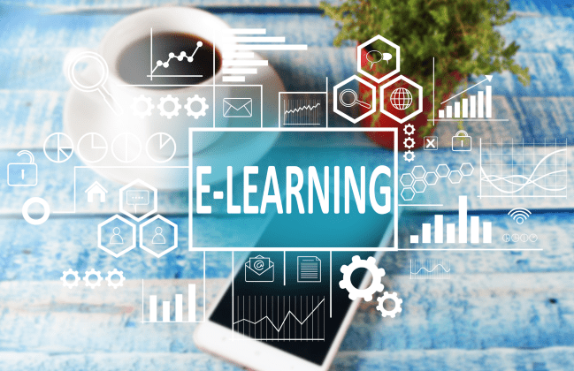 Elearning text typography over a blurred desktop with a cup of coffee and smartphone by airdone from Getty Images. Source: CanvaPro